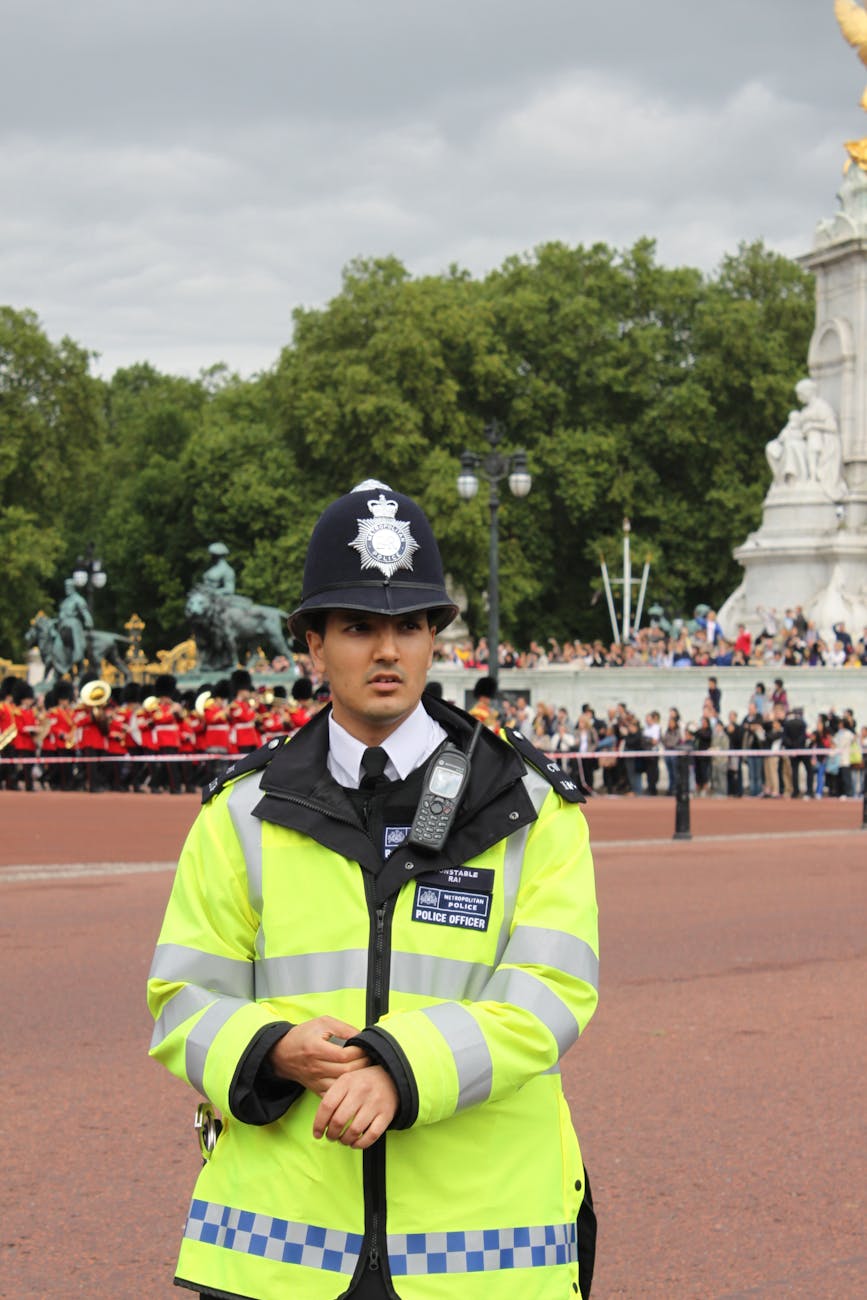 man in officer s uniform black standing during parade