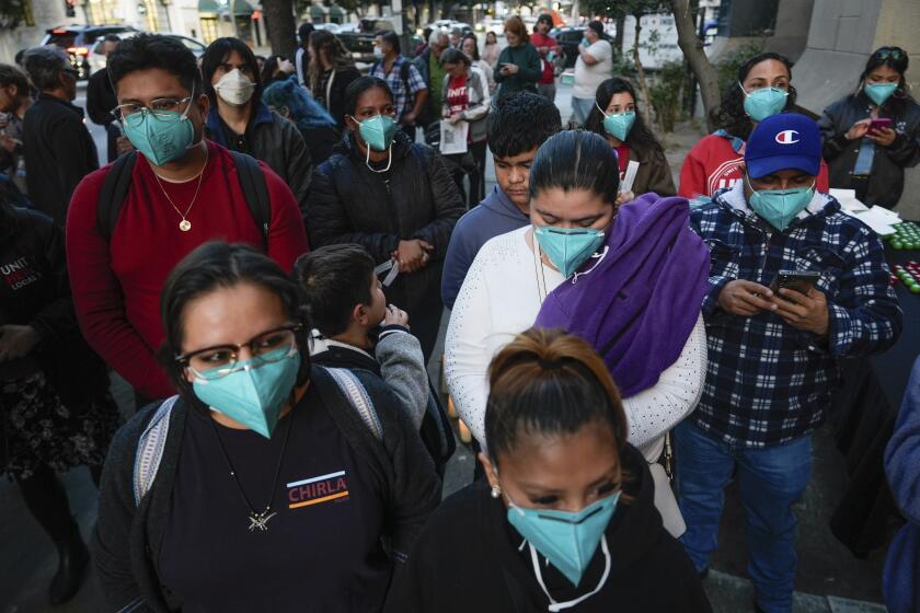 COVID wave washes over California. Some officials urge residents to mask up